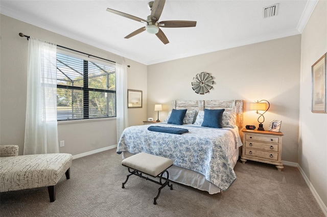 14309 Carolina Sky Pl, Lakewood Ranch, FL 34211 - carpeted bedroom with baseboards, visible vents, ornamental molding, and a ceiling fan