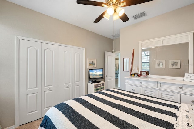 14309 Carolina Sky Pl, Lakewood Ranch, FL 34211 - bedroom featuring a closet, visible vents, a ceiling fan, and light colored carpet