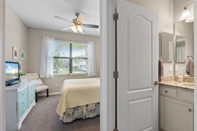 14309 Carolina Sky Pl, Lakewood Ranch, FL 34211 - carpeted bedroom with ceiling fan and baseboards