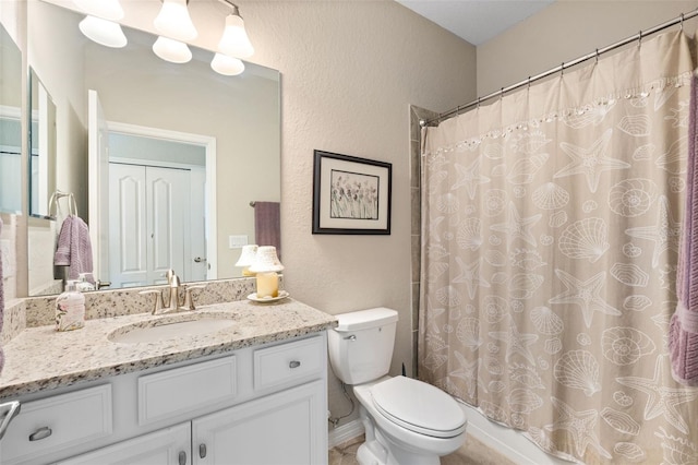 14309 Carolina Sky Pl, Lakewood Ranch, FL 34211 - bathroom featuring toilet, a textured wall, vanity, and a shower with shower curtain