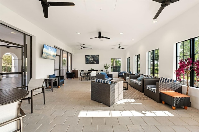 14309 Carolina Sky Pl, Lakewood Ranch, FL 34211 - living room with recessed lighting, light tile patterned flooring, and ceiling fan