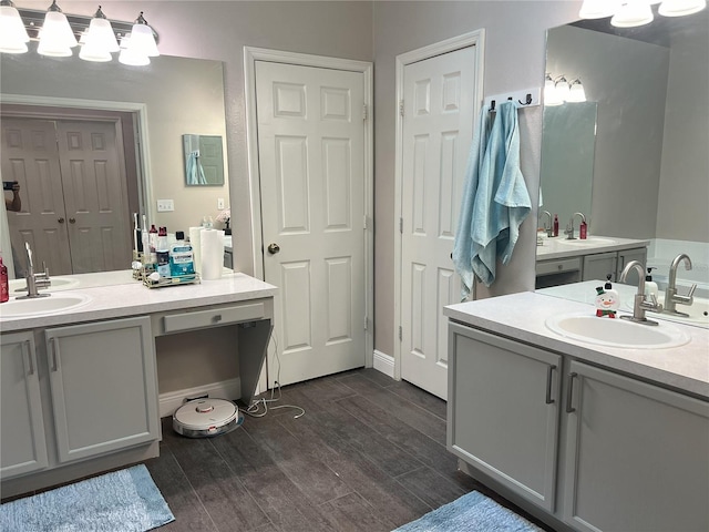 bathroom with two vanities and a sink