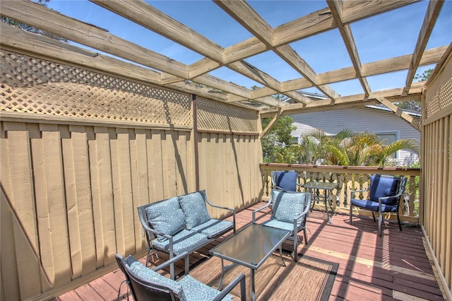 wooden terrace with outdoor lounge area
