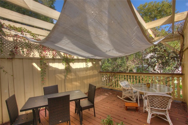 525 Rawls Ave, Sarasota, FL 34236 - wooden terrace featuring outdoor dining space