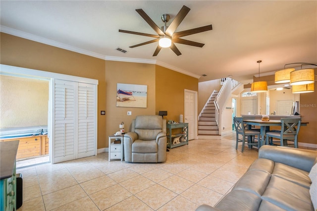 living room featuring light tile patterned flooring, ceiling fan, baseboards, and stairway