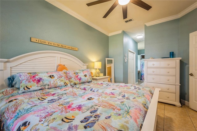 bedroom with ceiling fan, tile patterned flooring, visible vents, ornamental molding, and a closet