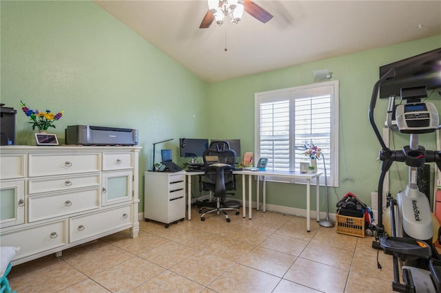 home office with baseboards, a ceiling fan, lofted ceiling, and light tile patterned floors