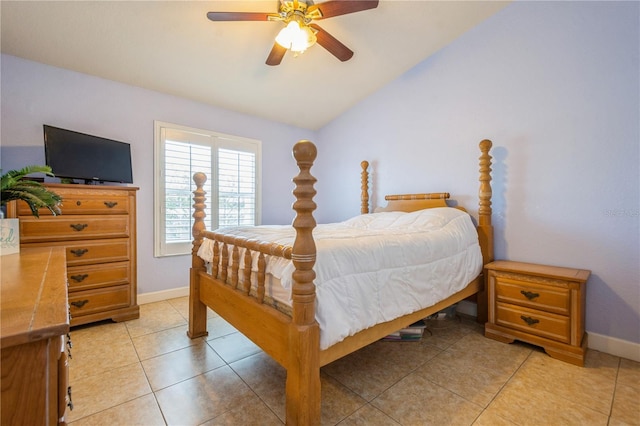 bedroom with baseboards, ceiling fan, light tile patterned flooring, and lofted ceiling