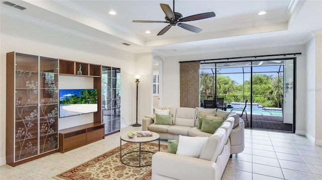 1358 Cielo Ct, North Venice, FL 34275 - tiled living area featuring visible vents, recessed lighting, ceiling fan, a raised ceiling, and baseboards