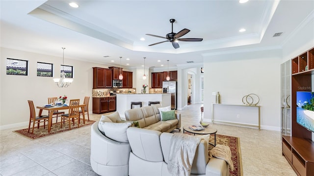 1358 Cielo Ct, North Venice, FL 34275 - living area featuring light tile patterned floors, ceiling fan with notable chandelier, a tray ceiling, visible vents, and recessed lighting