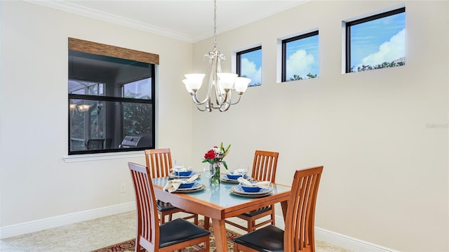 1358 Cielo Ct, North Venice, FL 34275 - dining area featuring an inviting chandelier, ornamental molding, and baseboards