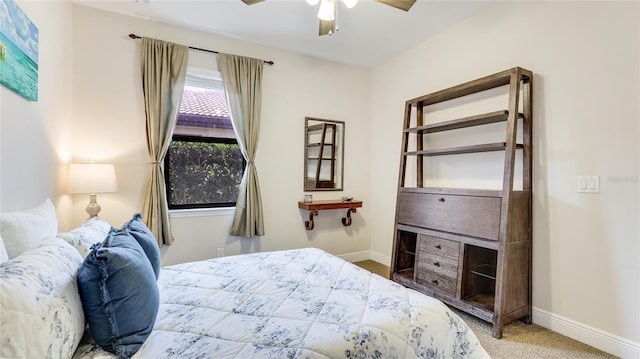 1358 Cielo Ct, North Venice, FL 34275 - carpeted bedroom with ceiling fan and baseboards