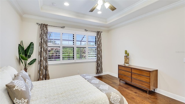 1358 Cielo Ct, North Venice, FL 34275 - bedroom featuring wood finished floors, recessed lighting, crown molding, a raised ceiling, and baseboards