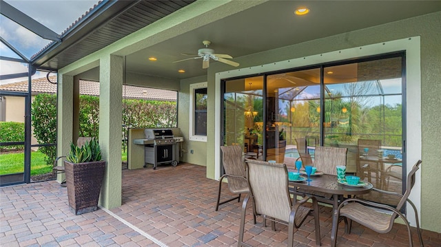 1358 Cielo Ct, North Venice, FL 34275 - view of patio / terrace featuring a lanai, outdoor dining area, a ceiling fan, and a grill