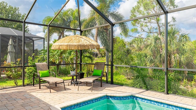 1358 Cielo Ct, North Venice, FL 34275 - pool featuring a patio area and glass enclosure