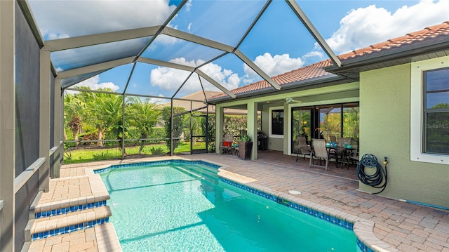 1358 Cielo Ct, North Venice, FL 34275 - outdoor pool featuring a patio area, glass enclosure, and ceiling fan