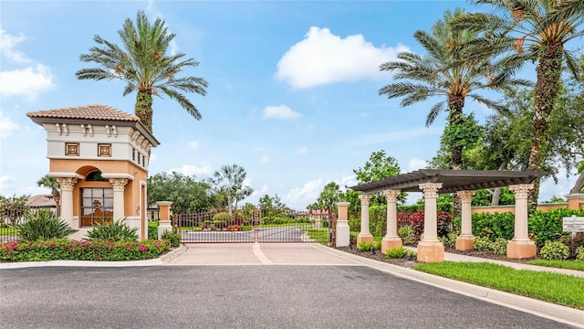 1358 Cielo Ct, North Venice, FL 34275 - view of street with a gated entry, a gate, and curbs