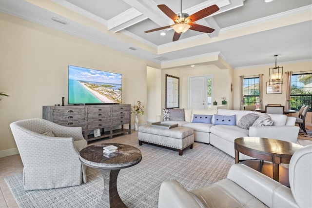 living room with beamed ceiling, coffered ceiling, baseboards, ornamental molding, and ceiling fan with notable chandelier
