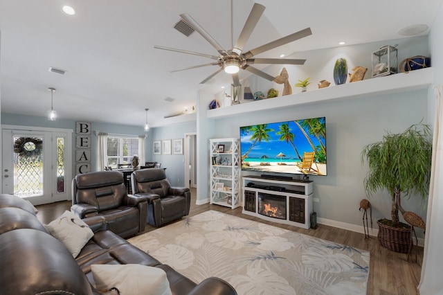 3889 Canopy Way, Sarasota, FL 34235 - living room featuring a ceiling fan, wood finished floors, recessed lighting, vaulted ceiling, and baseboards