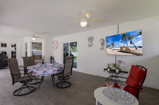 3889 Canopy Way, Sarasota, FL 34235 - dining space with a ceiling fan, wood finished floors, and french doors