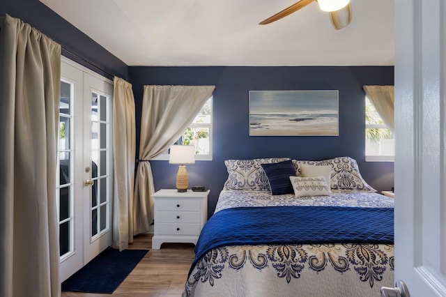 3889 Canopy Way, Sarasota, FL 34235 - bedroom featuring french doors, wood finished floors, and ceiling fan