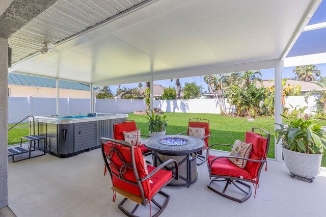 3889 Canopy Way, Sarasota, FL 34235 - view of patio / terrace with a fire pit and a hot tub
