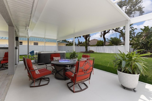 3889 Canopy Way, Sarasota, FL 34235 - view of patio featuring a hot tub and a fire pit
