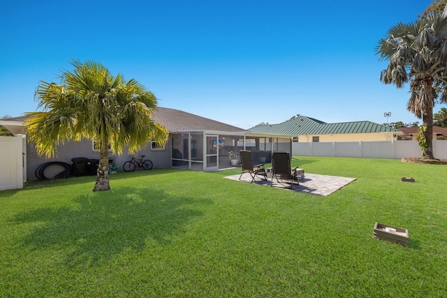 3889 Canopy Way, Sarasota, FL 34235 - back of property with a patio area and a sunroom