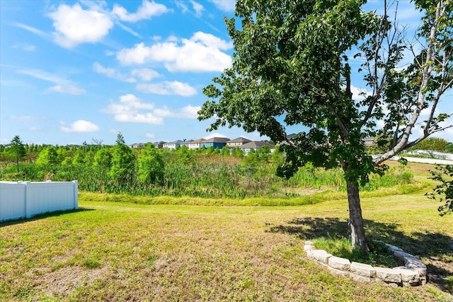view of yard with fence