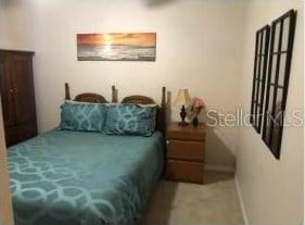 25 Philox Ln, Palm Coast, FL 32164 - bedroom featuring baseboards