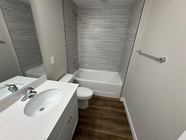 475 Tobias St SE, Palm Bay, FL 32909 - bathroom featuring wood finished floors, toilet, vanity, and shower / washtub combination