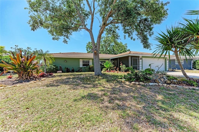 ranch-style house featuring stucco siding, concrete driveway, a front yard, and an attached garage