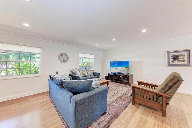 living room featuring baseboards, recessed lighting, ornamental molding, and light wood finished floors