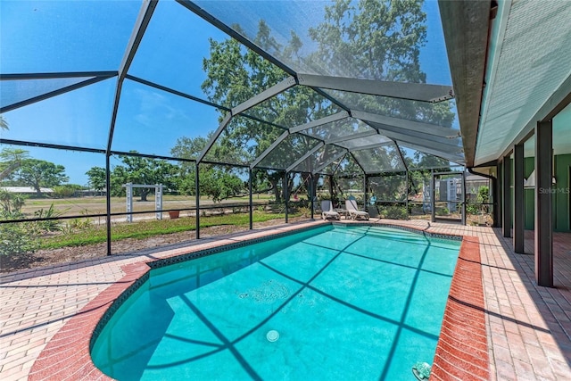 pool with a patio and a lanai