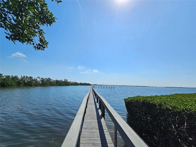 view of dock with a water view