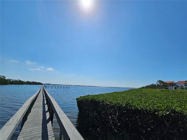 view of dock with a water view