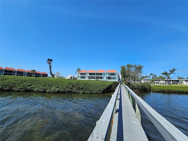 dock area featuring a water view