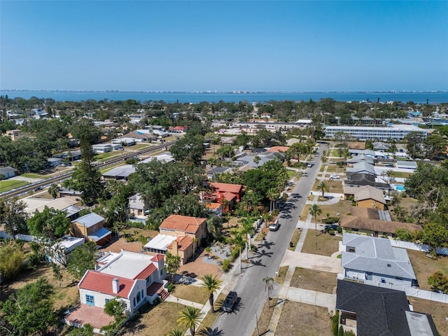 birds eye view of property featuring a residential view and a water view