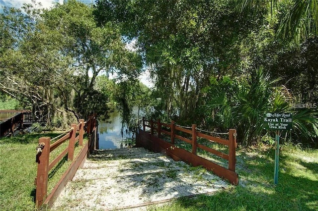 6231 Cypress Bend Ct, University Park, FL 34201 - gate with a water view and a yard