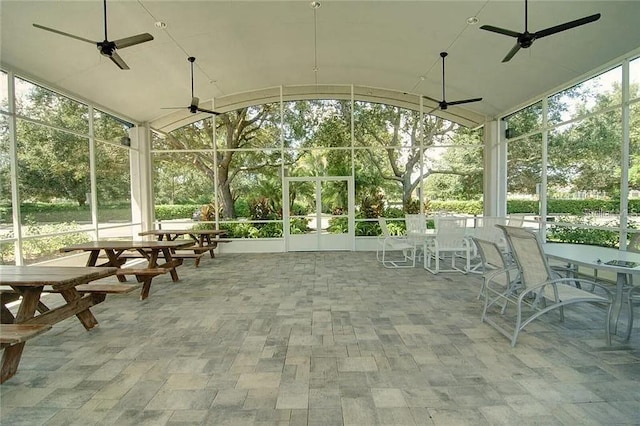 6231 Cypress Bend Ct, University Park, FL 34201 - sunroom featuring a ceiling fan, outdoor dining area, and lofted ceiling