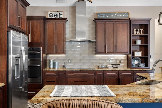 6231 Cypress Bend Ct, University Park, FL 34201 - kitchen featuring wall chimney exhaust hood, a sink, stainless steel fridge, open shelves, and multiple ovens