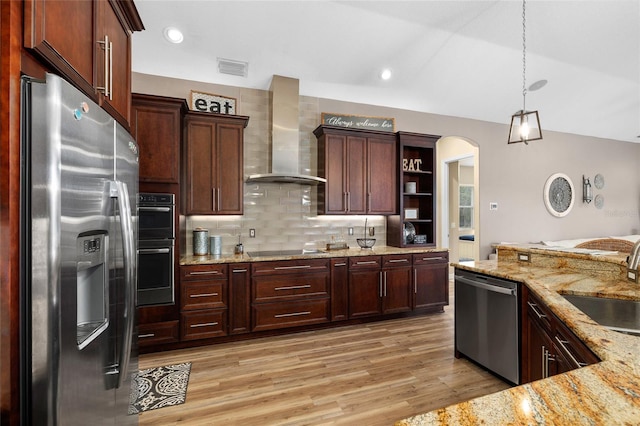 6231 Cypress Bend Ct, University Park, FL 34201 - kitchen featuring appliances with stainless steel finishes, wall chimney range hood, a sink, light wood finished floors, and open shelves