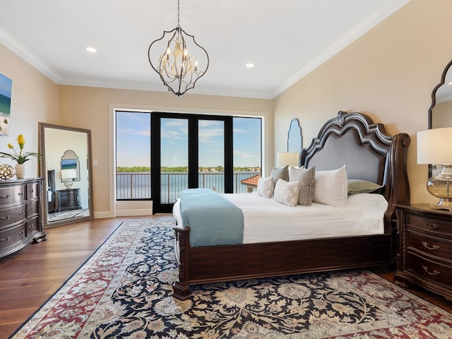 bedroom featuring recessed lighting, access to exterior, ornamental molding, and wood finished floors