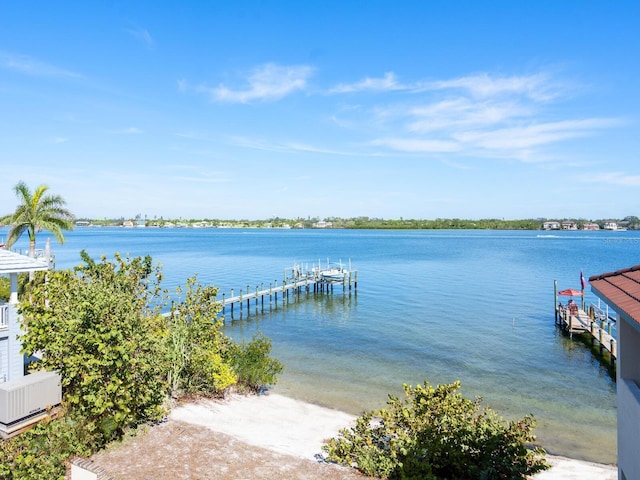 view of dock featuring a water view and boat lift