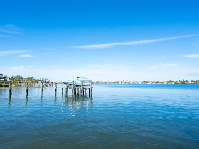 view of dock with a water view and boat lift