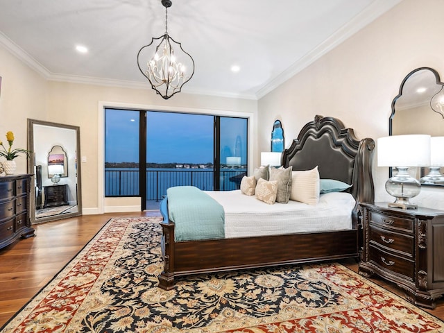 bedroom featuring a chandelier, recessed lighting, ornamental molding, wood finished floors, and access to outside