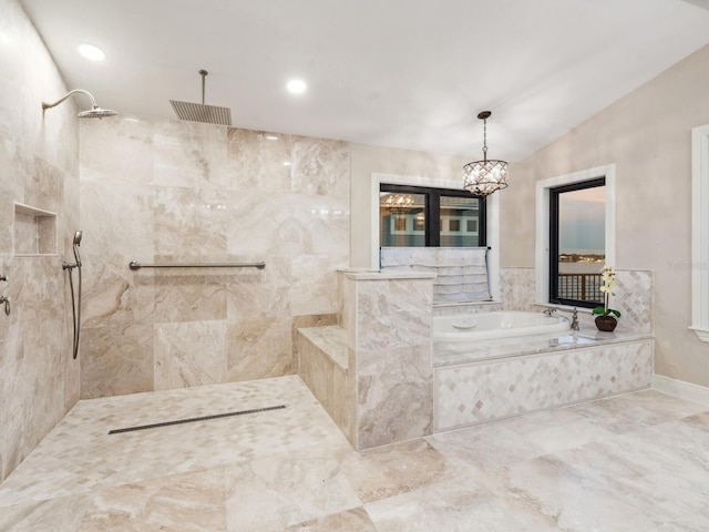 full bathroom featuring a tile shower, a garden tub, and marble finish floor