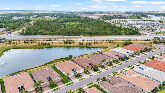 aerial view featuring a water view and a residential view