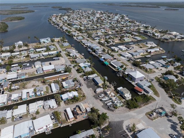 aerial view featuring a water view and a residential view