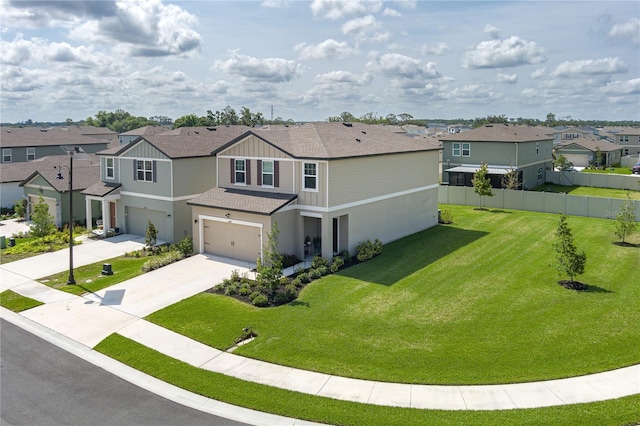 10464 Ladybug Cv, Parrish, FL 34219 - view of front of house with a residential view, concrete driveway, a garage, a shingled roof, and stucco siding